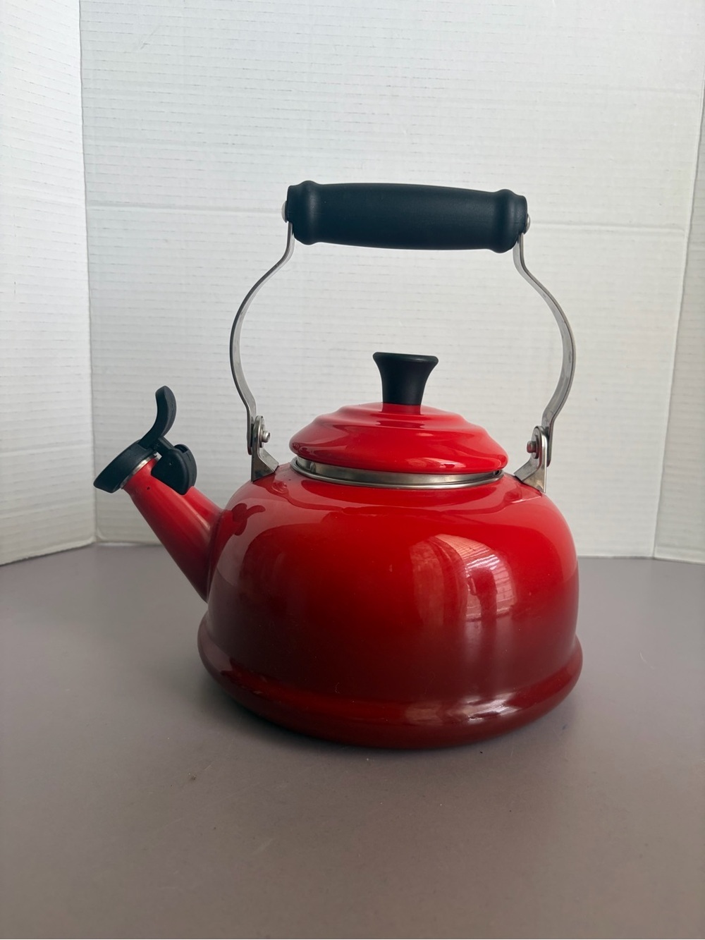Le Creuset Red Enamel Whistling Kettle with Black Handle
